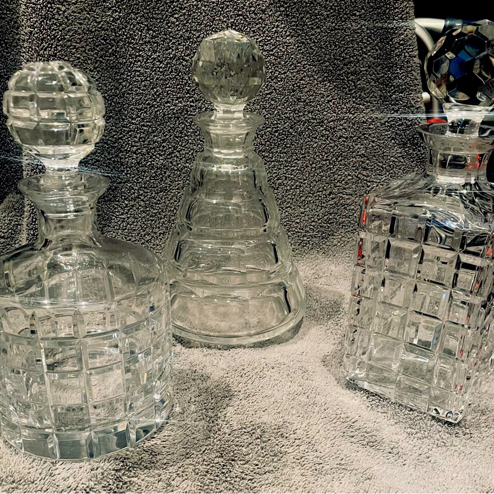Set of three crystal heavy decanters like new